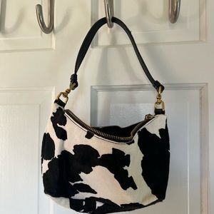 Cow print baguette shaped bag
